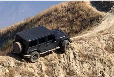 This Jeep Wrangler Got Stuck At The Top Of A Ridge (But Has Now Been Rescued)