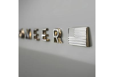 Jeep Teases Upcoming Grand Wagoneer's Badge and Interior