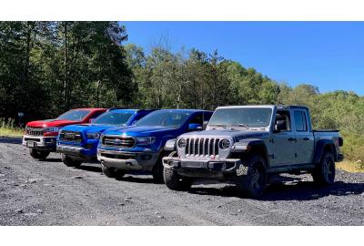 Ford, Chevy, Jeep, and Toyota take to the trails with their latest midsize trucks.