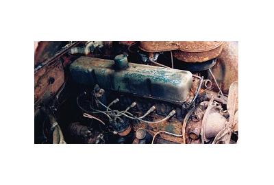 For engines and transmissions, when do you repair or replace?