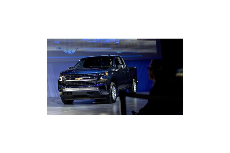 Luxury car owners trade up for American pickups as Ford, GM and Ram trucks dominate market