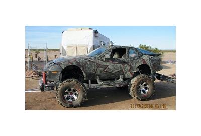 This Lifted 'Forsche' 944 Is The Great Unholy Bronco-Porsche Mashup We Deserve